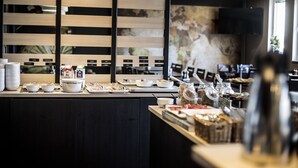 A breakfast bar with various food items and containers. - Best Western Hotel Solna (Solna)