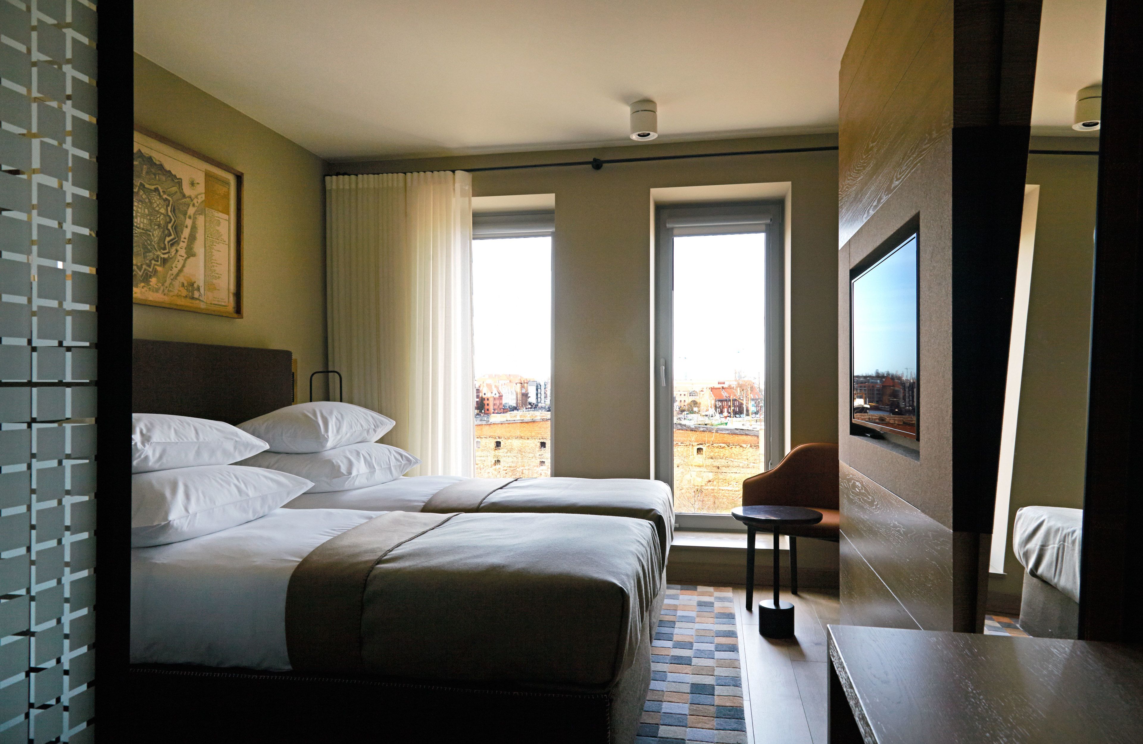 deluxe twin room | in-room safe, desk, soundproofing, free wifi