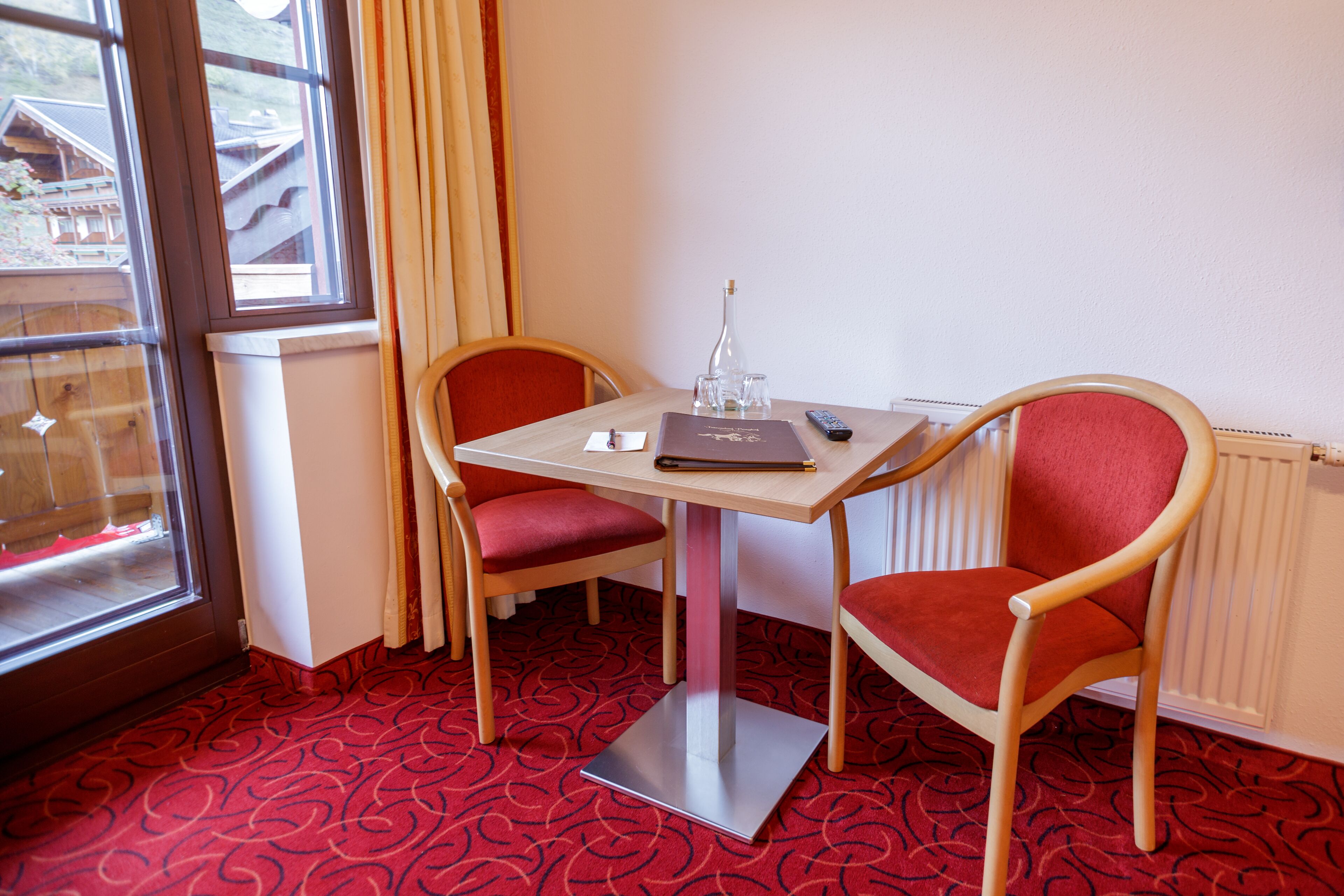 quadruple room, balcony, mountain view (haupthaus) | living area | 43-inch flat-screen tv with cable channels