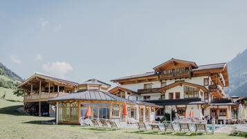 Indoor pool, outdoor pool, open 9:00 AM to 7:00 PM, pool umbrellas