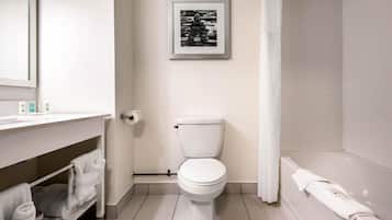 Standard Room, 2 Queen Beds, Non Smoking | Bathroom | Combined shower/tub, free toiletries, hair dryer, towels