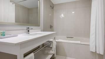 Standard Room, 1 Queen Bed, Non Smoking | Bathroom | Combined shower/tub, free toiletries, hair dryer, towels