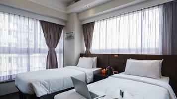 Quadruple Suite | In-room safe, desk, blackout curtains, iron/ironing board