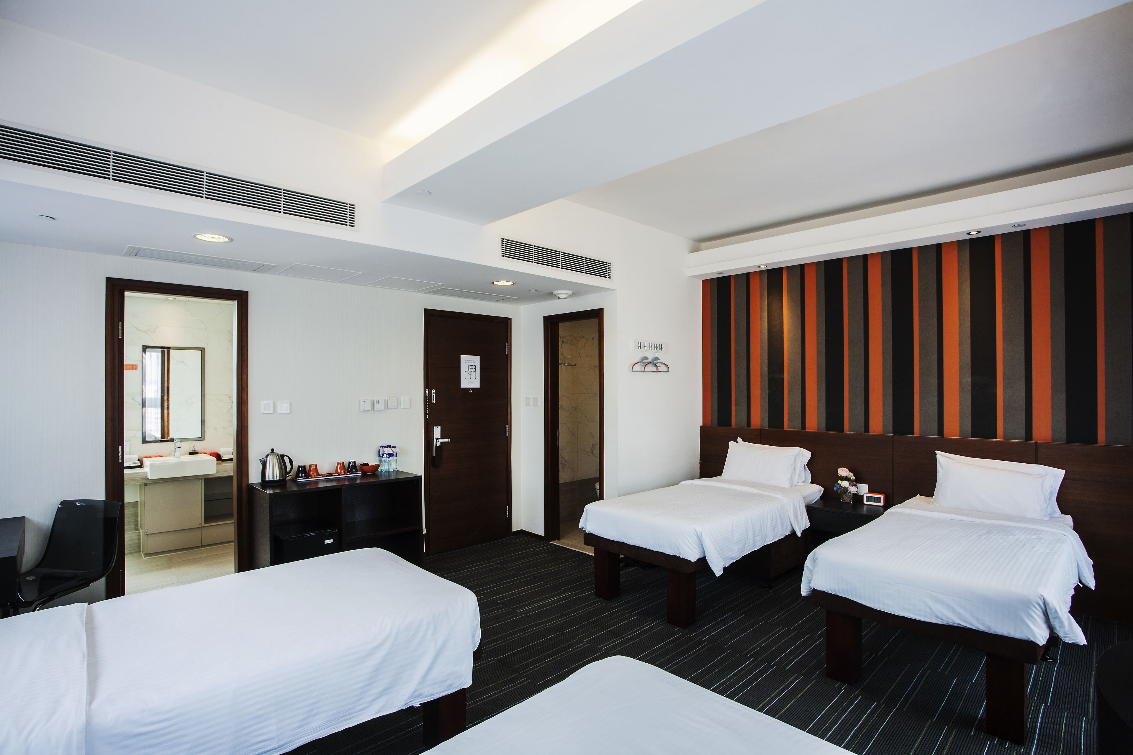 quadruple suite | in-room safe, desk, blackout curtains, iron/ironing board