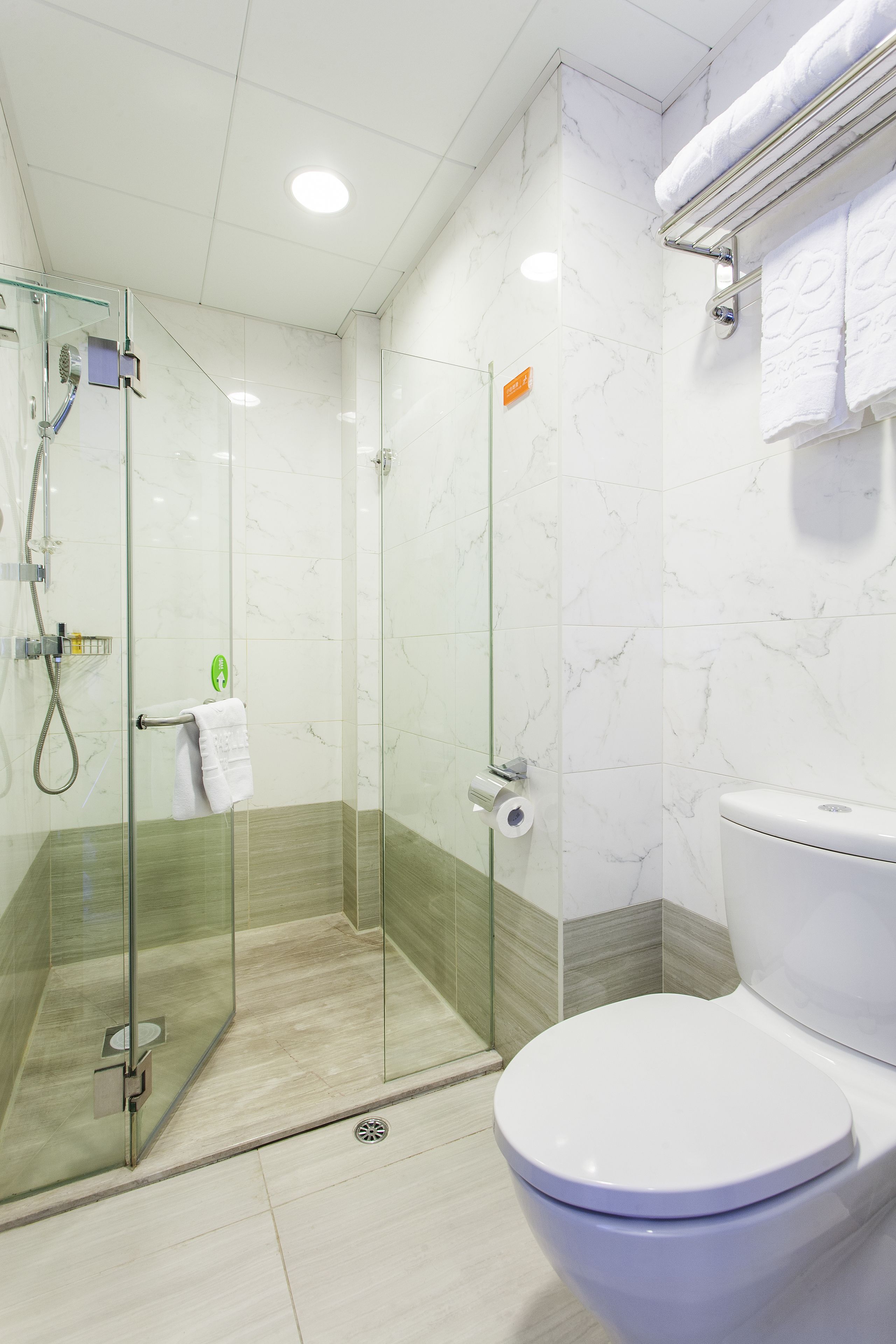 premier king room | bathroom | shower, free toiletries, hair dryer, slippers