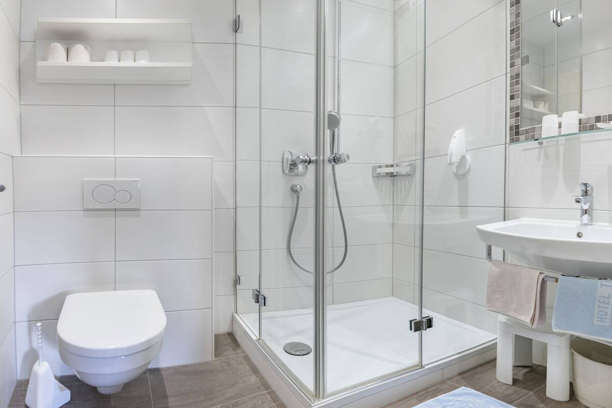 comfort double room, balcony, mountain view | bathroom | free toiletries, hair dryer, towels