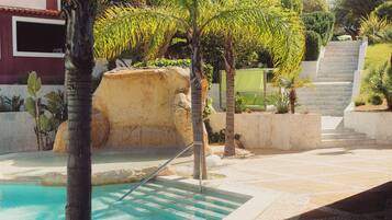 Outdoor pool, pool umbrellas, sun loungers