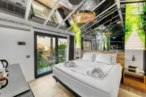 Luxe beddengoed, een minibar, een kluis op de kamer, gratis wifi