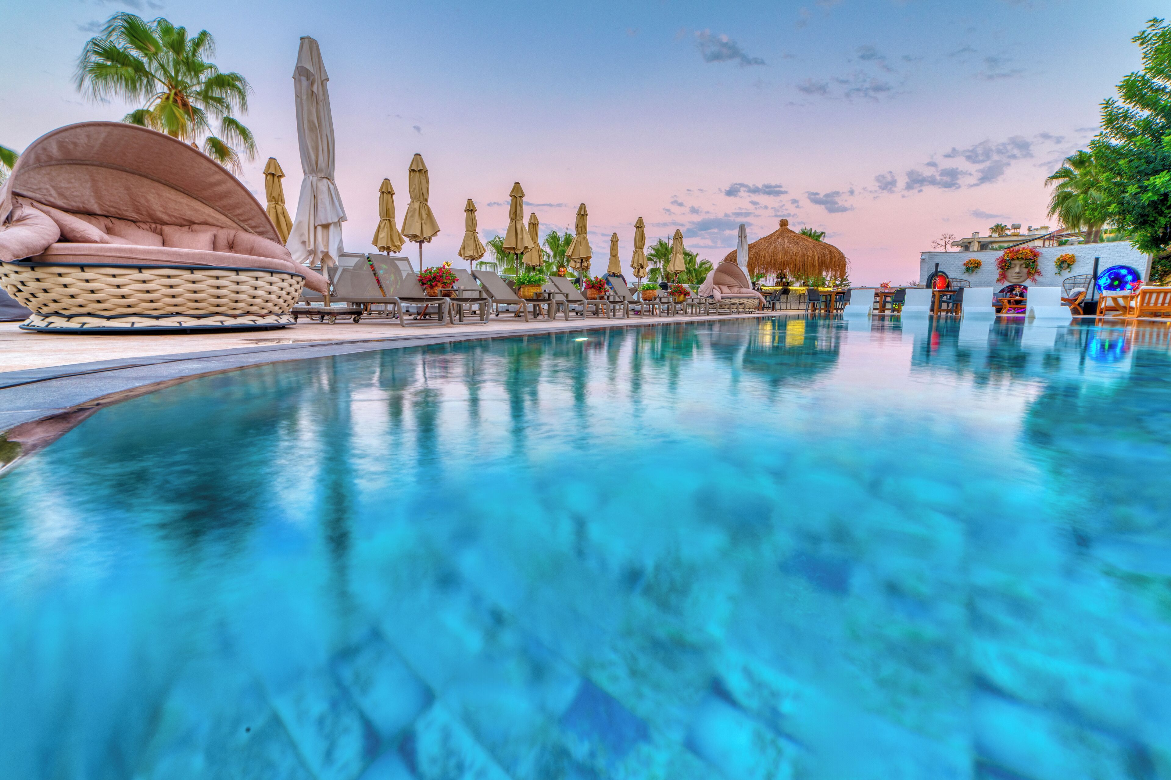 2 outdoor pools, open 8:00 AM to 8:00 PM, pool umbrellas, sun loungers