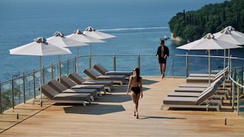 2 outdoor pools, pool umbrellas, sun loungers