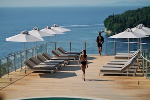 2 outdoor pools, pool umbrellas, sun loungers