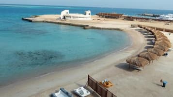 Private beach nearby, beach shuttle, sun-loungers, beach umbrellas