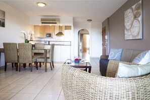 Apartment, 2 Bedrooms | Living area | Flat-screen TV