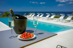 Seasonal outdoor pool, an infinity pool