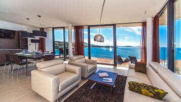 Luxury Penthouse, 2 Bedrooms, Terrace, Sea View | Living room | LCD TV