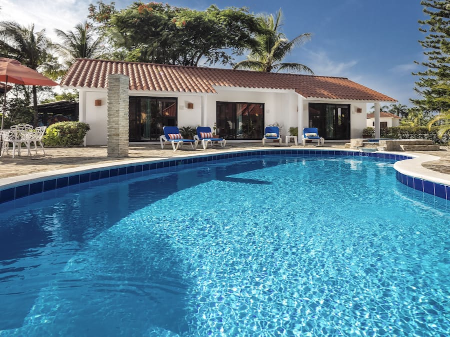 Outdoor pool, pool umbrellas, sun loungers