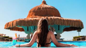 2 outdoor pools, pool umbrellas, pool loungers