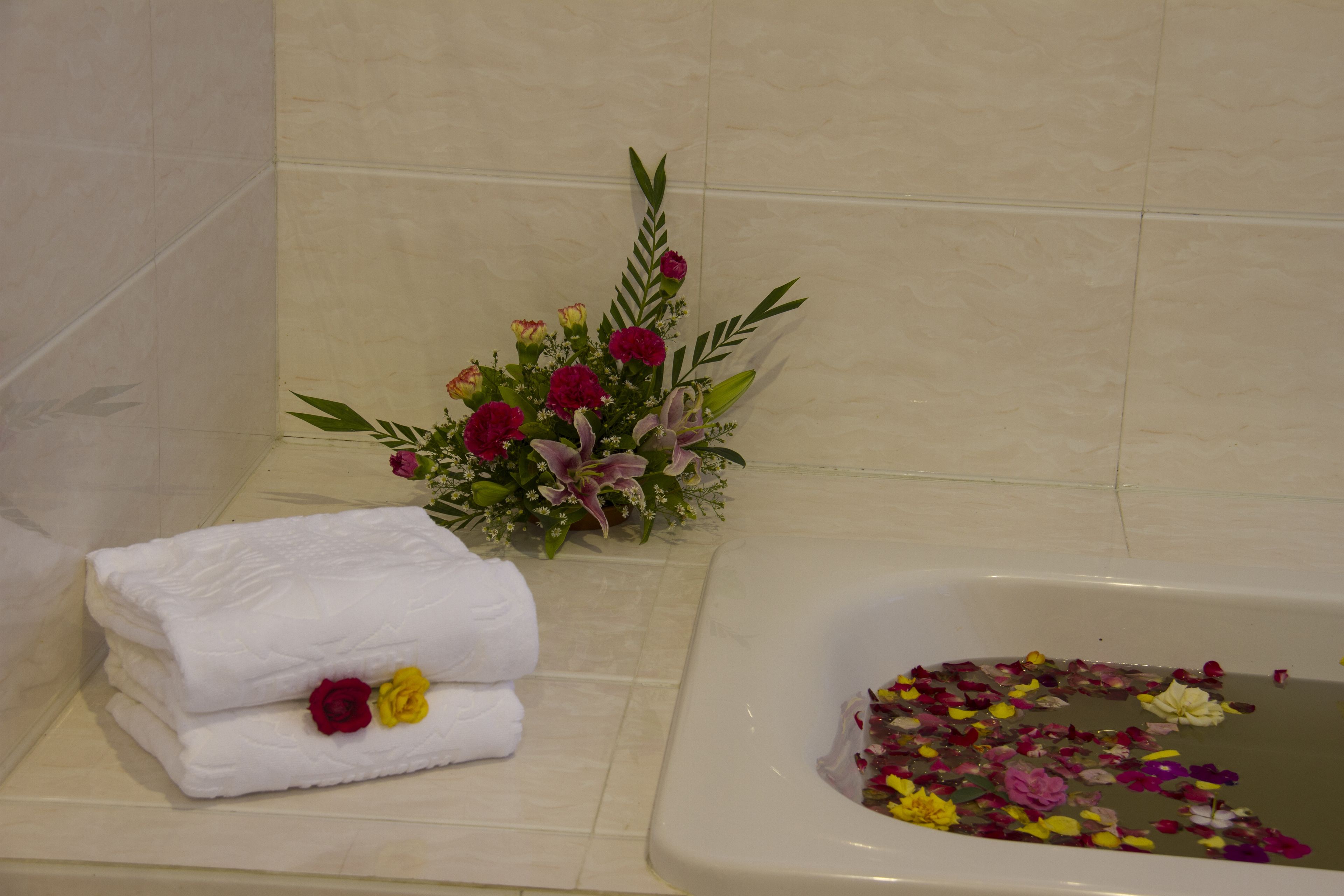 junior triple room | bathroom amenities | rainfall showerhead, free toiletries, hair dryer, bathrobes