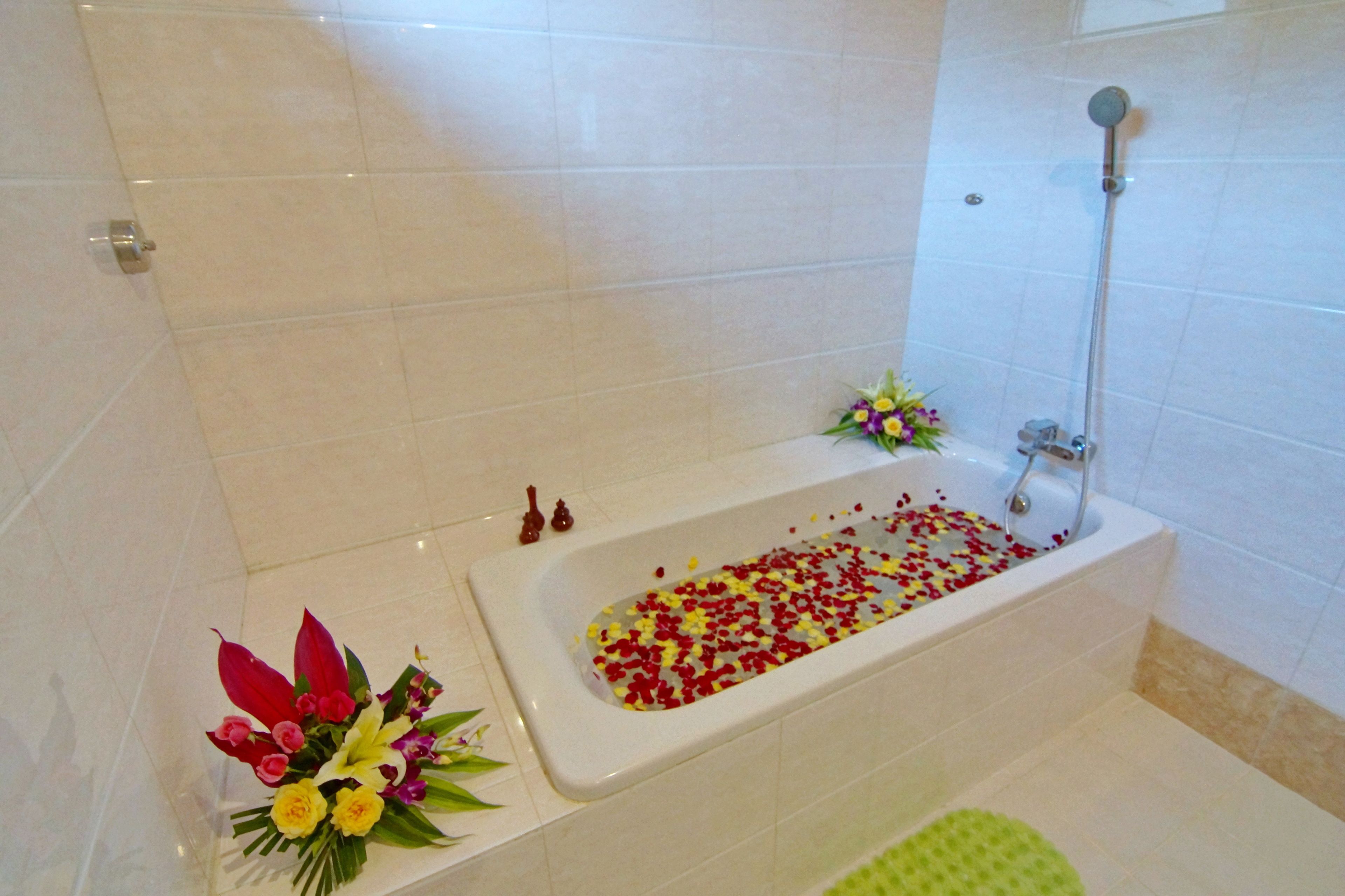 junior triple room | bathroom amenities | rainfall showerhead, free toiletries, hair dryer, bathrobes