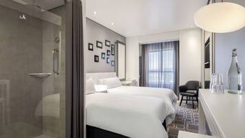 Room, 2 Single Beds | Minibar, in-room safe, individually decorated, individually furnished