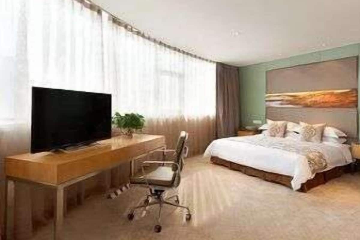 Minibar, coffres-forts dans les chambres, bureau, rideaux occultants