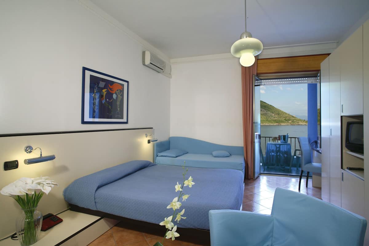 Comfort Triple Room, Sea View | Premium bedding, minibar, in-room safe, desk