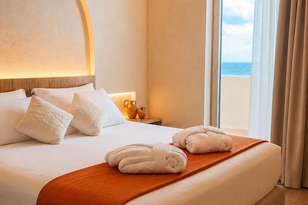Classic Double Room, Partial Sea View | Premium bedding, minibar, in-room safe, desk