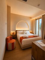 Comfort Double Room, Partial Sea View | Premium bedding, minibar, in-room safe, desk