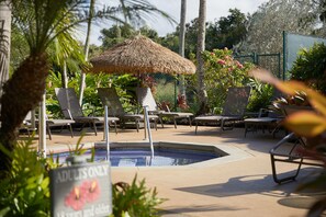 2 outdoor pools, open 9:00 AM to 10:00 PM, pool umbrellas, pool loungers