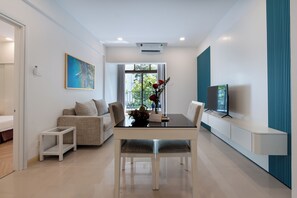 Apartment, 1 Bedroom | Living area | LCD TV