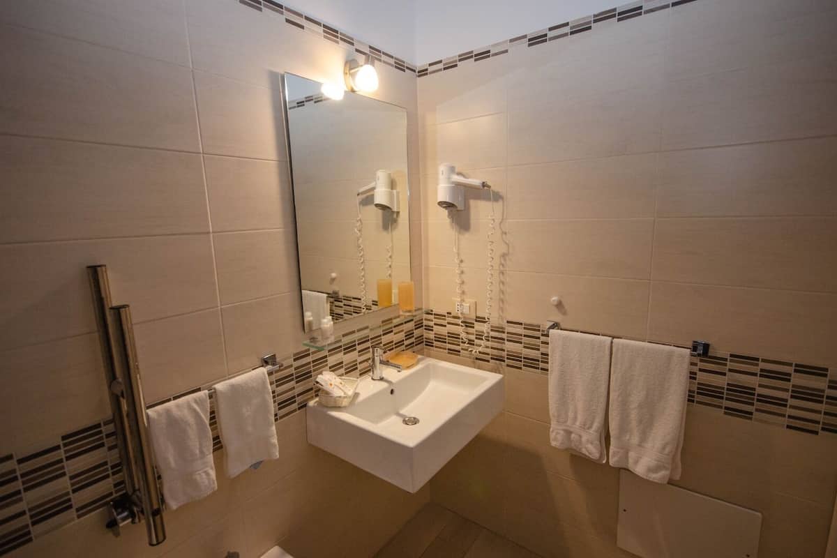 traditional double room, annex building | bathroom | shower, free toiletries, hair dryer, towels