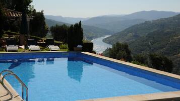 Seasonal outdoor pool, pool umbrellas, sun loungers