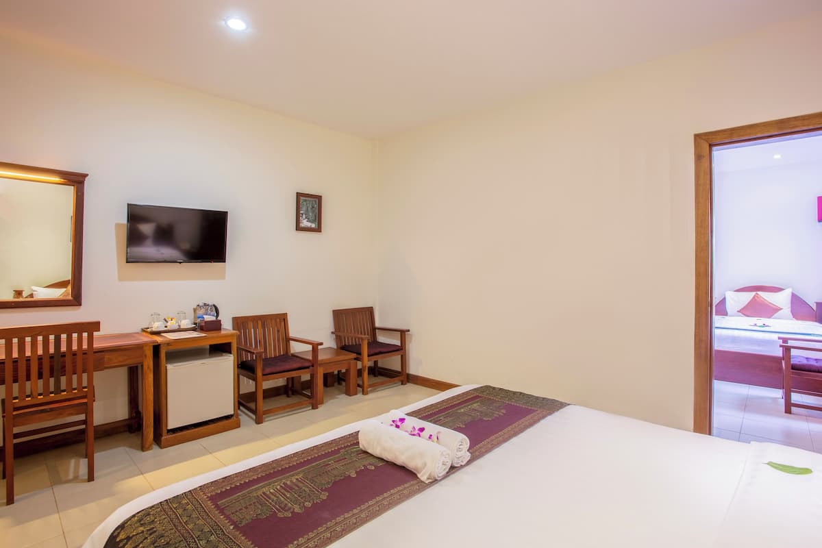 Family Room, 2 Bedrooms, Balcony | Minibar, in-room safe, individually decorated, individually furnished