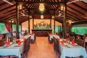 Breakfast, lunch, dinner served; international cuisine, pool views 