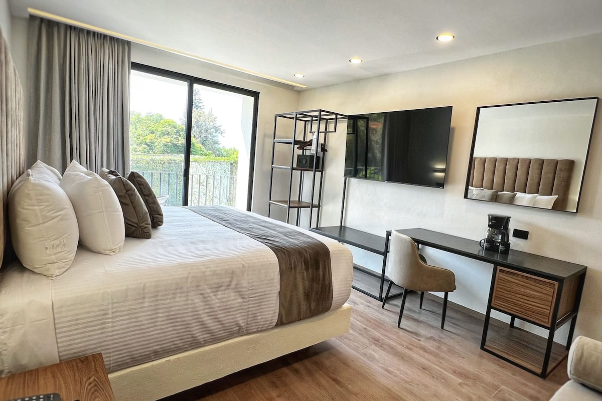 deluxe room | desk, laptop workspace, blackout curtains, free wifi