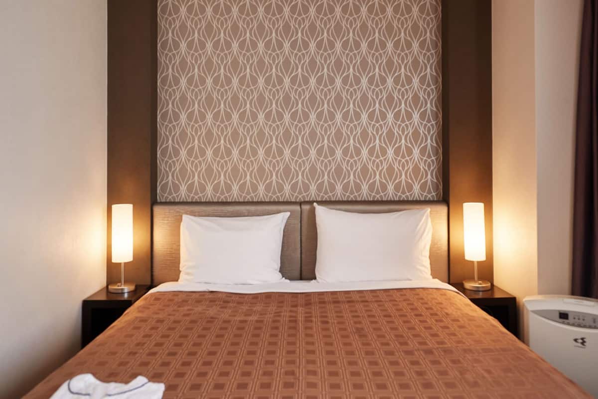 Premium bedding, individually furnished, desk, blackout drapes
