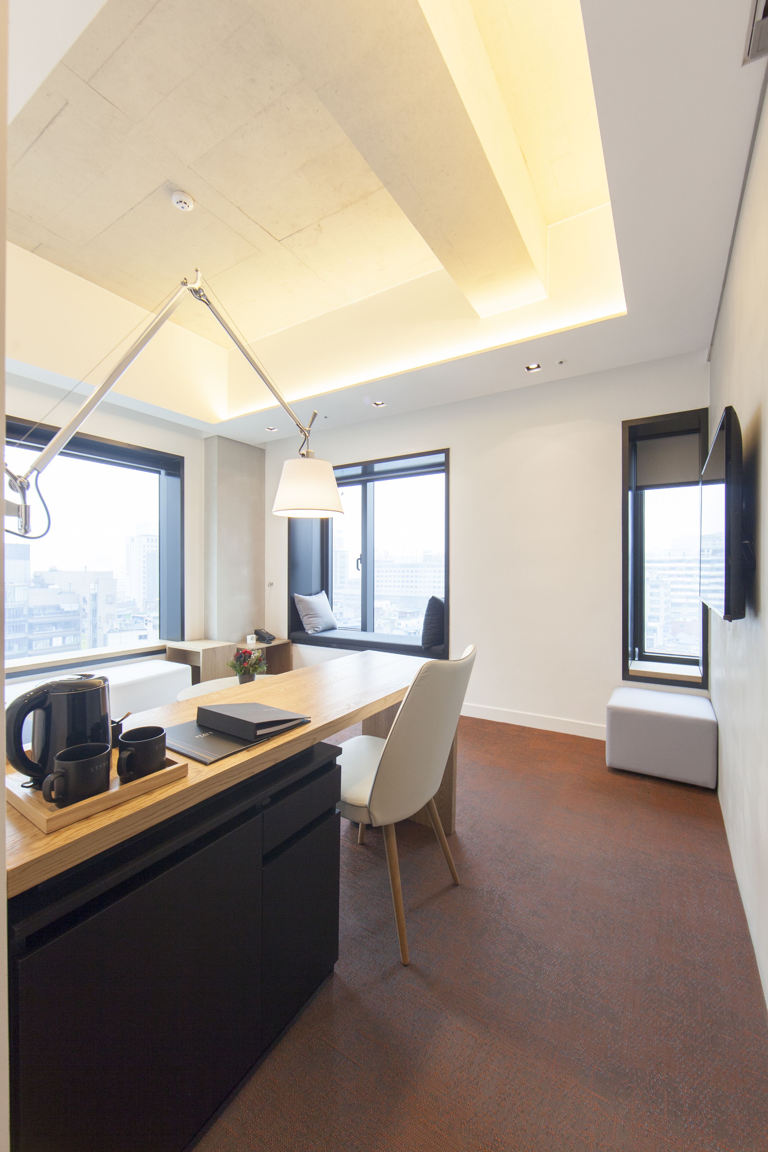 duplex room (no parking, free light breakfast) | living area | led tv