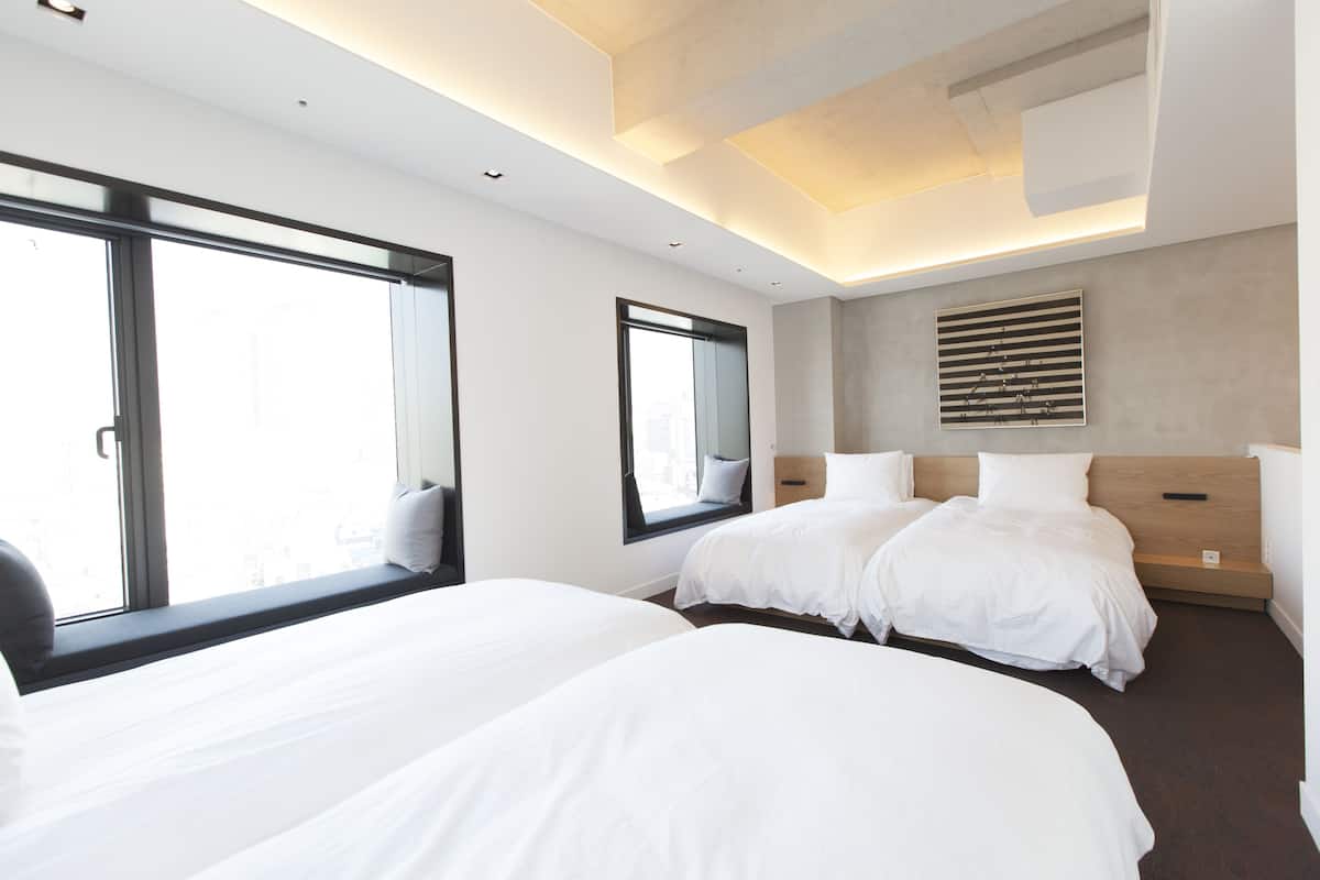 Duplex Room (No Parking, Free Light Breakfast) | 1 bedroom, premium bedding, in-room safe, iron/ironing board