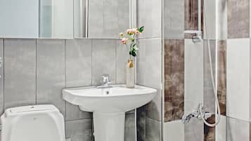Shower, free toiletries, hair dryer, slippers