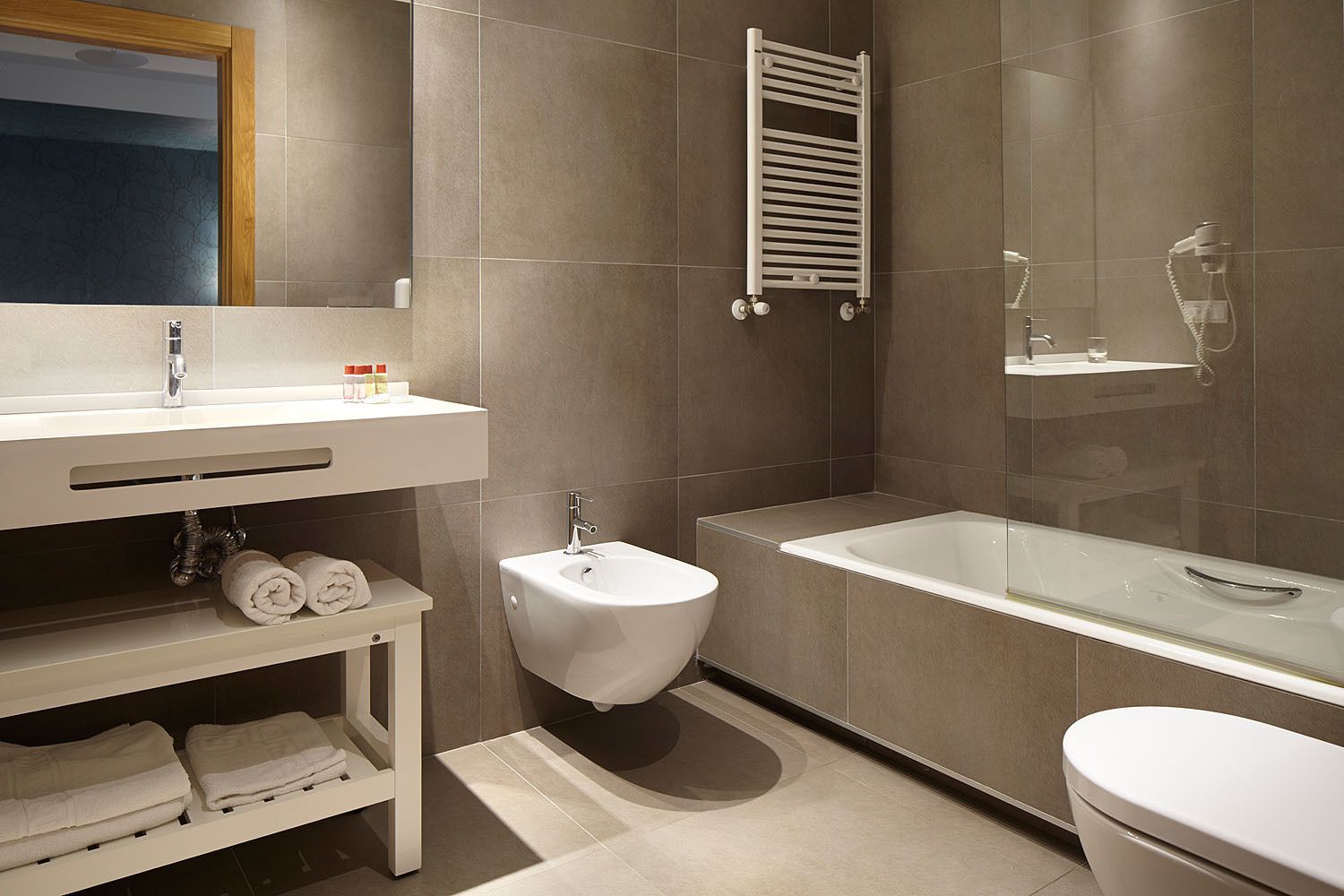 double room | bathroom | deep-soaking bathtub, rainfall showerhead, free toiletries, hair dryer