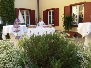 Breakfast, lunch, dinner served; local cuisine, pool views