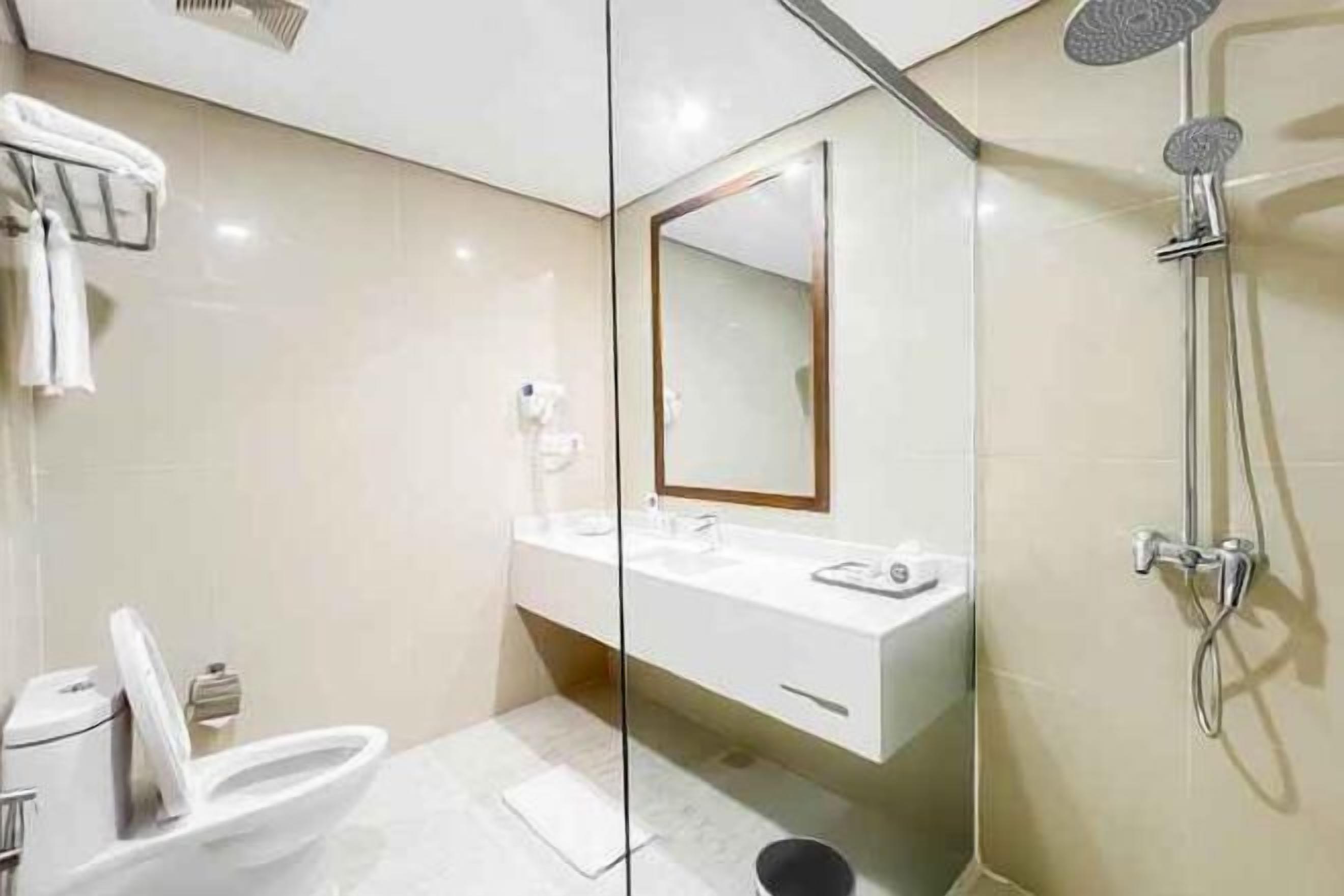 Shower, free toiletries, hair dryer, slippers