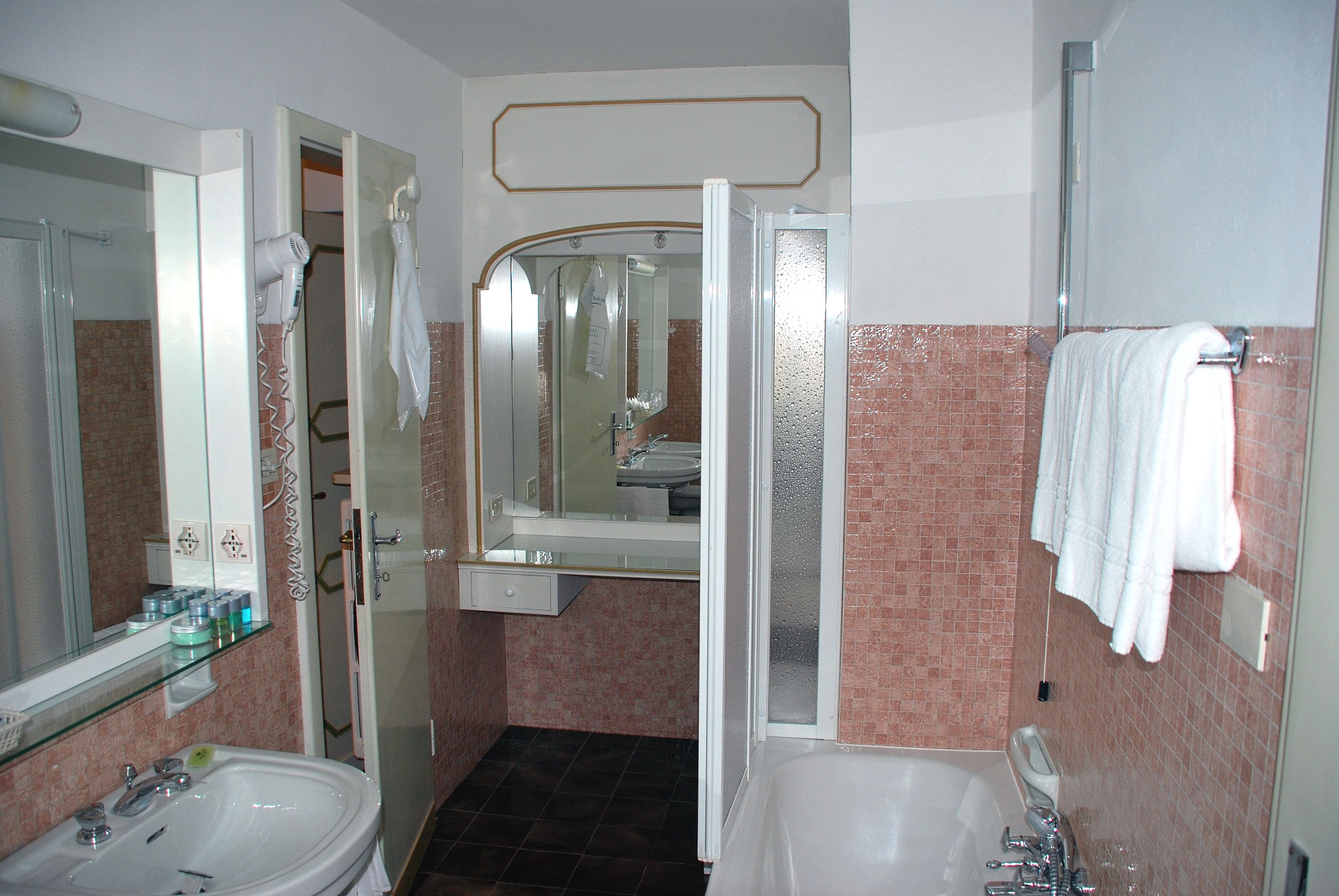 free toiletries, hair dryer, slippers, bidet