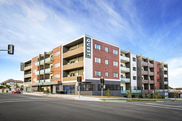 A multi-story hotel with a modern design, featuring balconies and a prominent "QUEST" sign. - Quest Nowra (Nowra)