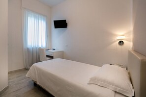 Desk, free WiFi, bed sheets