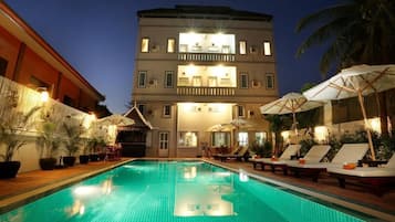 Outdoor pool, pool umbrellas, pool loungers