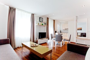 Premium Apartment, 2 Bedrooms | Living area | Flat-screen TV
