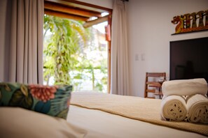 Deluxe Bungalow, Ground Floor | Minibar, in-room safe, individually decorated, free WiFi