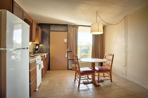 Room, 2 Double Beds, Kitchenette | In-room dining