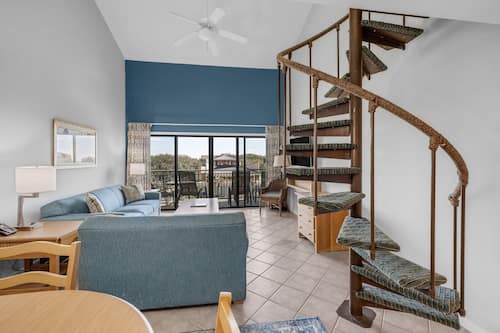 Deluxe Loft, 1 Bedroom | Living area | 32-inch flat-screen TV with satellite channels, DVD player